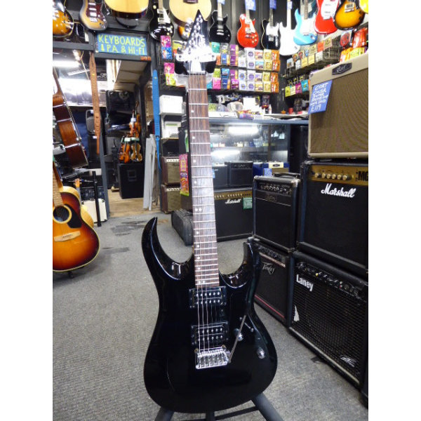 <p>Excellent double cut guitar with great playability, gloss black finish, 2 Powersound humbuckers with high output and great for rock/metal.</p><p>Good condition.</p>