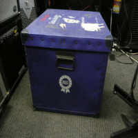 <p>Flight case with fibreboard shell. &nbsp;Can be used for drum hardware, lighting par cans, etc.</p><p>Condition: Various scrapes, and a big gash across the top (as seen in pics).</p>