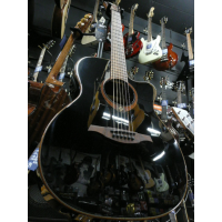 <p>Gorgeous solid top electro by Lag.&nbsp; Black high gloss finish.</p>