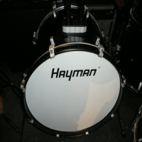 Excellent 5-piece beginner drum kit including cymbals, stands, stool, kick pedal, and sticks.