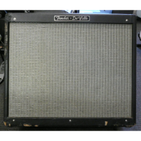 <p>Superb all-valve 2x12 guitar amp by Fender.</p><p>Condition: various rips in the bottom and side edges, otherwise good.</p>