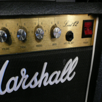 <p>'80s Marshall combo with 12 watts of power, 10" Celestion speaker, and more.&nbsp; Good condition.</p><p></p>