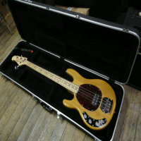 <p>Stunning and affordable left-handed Music Man style bass guitar with hard case.</p><p>Excellent condition.</p>