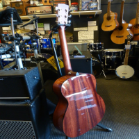 Quality OM (orchestra size) acoustic guitar with solid top &amp; back.&nbsp; This beauty also features Grover tuners, bone nut &amp; saddle, tortoiseshell binding, and general awesomeness all round!