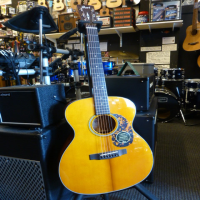 Quality OM (orchestra size) acoustic guitar with solid top &amp; back.&nbsp; This beauty also features Grover tuners, bone nut &amp; saddle, tortoiseshell binding, and general awesomeness all round!