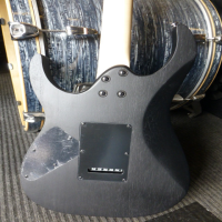 <p>Awesome beginner guitar with open pore matte black finish, lightweight construction, two humbucking pickups, floating bridge, and more!</p><p>Great for Rock and Metal!</p>