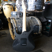 <p>Awesome beginner guitar with open pore matte black finish, lightweight construction, two humbucking pickups, floating bridge, and more!</p><p>Great for Rock and Metal!</p>