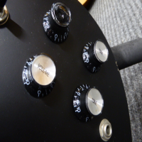 <p>Entry-level SG copy with bolt-on neck.</p><p>Condition: Neck pocket cracks in the finish, and missing cap on one of the volume knobs, nothing major.</p>