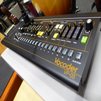 The VP-03 is a miniature version of the VP-330 Vocoder Plus, one of the most popular vocoders ever made. Part of the Roland Boutique series, the VP-03 brings together the worlds of synthesized sound and the human voice, using the latest ACB technology to accurately emulate the sound that made the original so influential. The VP-03 has the VP-330&rsquo;s vocoder, human voice, and strings sound sources on board, and comes with a gooseneck microphone. And when paired with the optional K-25m Keyboard Unit, you&rsquo;ve got the authentic VP-330 vibe in a reliable, low-cost setup that&rsquo;s highly portable. There are new features too, including 16 Chord Memory setups and a Voice Step Sequencer for even more creative potential. Whether you want the classic, electro-infused &ldquo;talking robot&rdquo; sound or the expressive power of shaping synth sounds with the human voice, the VP-03 puts it all at your fingertips.<br /><br />
