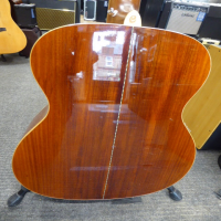 <p>Awesome all-solid acoustic guitar with great playability.</p><p>Condition: One small dent in the table, otherwise excellent.</p>