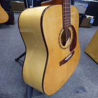 <p>Lovely dreadnought acoustic guitar, hand-crafted in Canada.</p><p>Condition: A few marks here and there, small dents on the back of the neck.</p>