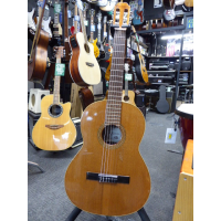 <p>Spanish-made classical guitar with solid top.</p><p>Condition: Various small marks on the table, otherwise good.</p>