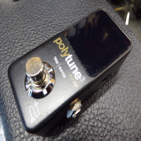 <p>Quality compact pedal tuner with original box.</p><p>Condition: A couple of tiny dents in the top, otherwise mint.</p>