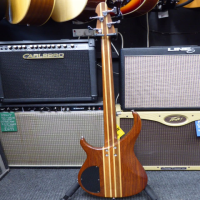 Nice natural wood finish 4-string bass in good condition.<br />