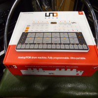 <p style="margin:0in;font-family:Calibri;font-size:11.0pt;">Made in collaboration with Italian analogue specialist Soundmachines, UNO Drum follows the acclaimed UNO Synth, combining massive analogue tone with digital flexibility and convenience.</p><p style="margin:0in;font-family:Calibri;font-size:11.0pt;">UNO Drum makes it easy to program and perform using the widest sonic palette to add professional drum grooves to your music.</p><p></p><p>Mint condition, boxed, with manual, midi breakout cables and USB cable.</p>