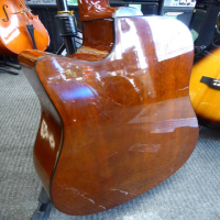 Decent Korean-made electro-acoustic guitar in good condition.