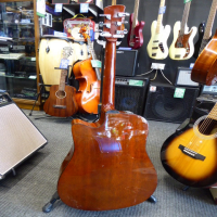 Decent Korean-made electro-acoustic guitar in good condition.