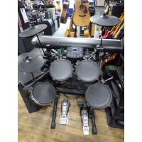 Decent entry-level electronic drum kit in good condition.