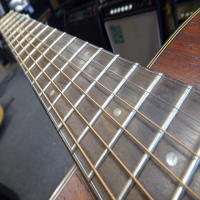 <p>Lovely small-bodied all-solid mahogany acoustic by Ibanez.</p><p>Condition: There is some artwork scraped into the back and a couple of small chips in the table, otherwise very good.</p>