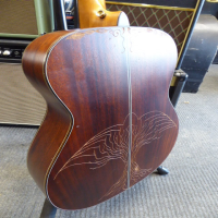 <p>Lovely small-bodied all-solid mahogany acoustic by Ibanez.</p><p>Condition: There is some artwork scraped into the back and a couple of small chips in the table, otherwise very good.</p>