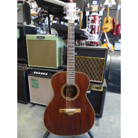 <p>Lovely small-bodied all-solid mahogany acoustic by Ibanez.</p><p>Condition: There is some artwork scraped into the back and a couple of small chips in the table, otherwise very good.</p>