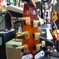 <p>Very playable hybrid guitar with both acoustic and electric pickups.</p><p>Condition: The built-in tuner doesn't work (we can throw a free clip-on headstock tuner in), and a few tiny marks, otherwise excellent.</p>