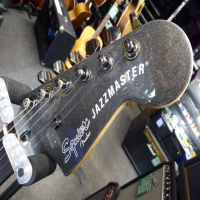 <p>Discontinued Jazzmaster with active circuit, twin humbucking pickups, stoptail bridge, Graphite Metallic finish, and matching headstock.</p><p>Condition: A little chip in the headstock finish near the truss rod cavity, otherwise excellent.</p>