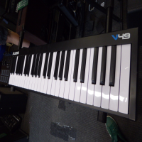 <p>49
full-size velocity-sensitive keys and Octave Up/Down buttons.</p><p>You can expand
the keyboard to the full melodic range and play bass lines, chords, and
melodies. </p><p>V49 also features four assignable knobs and buttons for manipulating
effect plugins and virtual instruments: open and close filters, adjust volume
levels, activate effects, tweak parameters, and more. </p><p>Eight velocity-sensitive
backlit pads allow you to launch clips or finger drum with exceptional
response, and pitch and modulation wheels expand the expressive capabilities of
your performing.</p>
