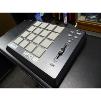 <p>The MPD18 is the easiest way to add genuine MPC pads to your setup. </p><p>This MIDI-over-USB pad controller for DJs, programmers, producers, and other musicians is built around the pads and controls from Akai Professional's industry-standard MPC series. </p><p>The MPD18 is an expressive and intuitive instrument for the studio and stage. </p><p>The heart of the MPD18 is its bank of 16 velocity and pressure-sensitive MPC pads, an Akai Pro exclusive. </p><p>You can access three different banks of sounds from the MPC pads for a total of 48 sounds at your fingertips. </p><p>The MPD18 also borrows the MPC series' assignable Q-Link controllers, enabling you to control nearly any parameters in your software in real time. You get an assignable Q-Link fader for natural, hands-on control of your most-used parameters, and MPC Note Repeat enables you to quickly input patterns such as hi-hat parts or drum rolls. </p><p>The MPD18 also has 16 configurable presets so you can program it for the way you work with different hardware and software.<br /><br />The MPD18 sends MIDI information over its plug-and-play USB interface so you can use it with your Mac or PC without installing any drivers. </p><p>The USB connection even powers the MPD18 so the included USB cable is all you need for portable production. </p><p>The MPD18 can control nearly any MIDI software, as well as MIDI hardware, such as synths, sound modules, samplers, sequencers, drum machines, and more.<br />The MPD18 gives you the control feel of the MPC in a super-portable instrument with a compact footprint that's easy to fit in any setup.<br /></p><p><br />&nbsp; &nbsp;&nbsp;</p>