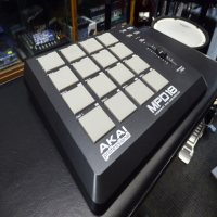 <p>The MPD18 is the easiest way to add genuine MPC pads to your setup. </p><p>This MIDI-over-USB pad controller for DJs, programmers, producers, and other musicians is built around the pads and controls from Akai Professional's industry-standard MPC series. </p><p>The MPD18 is an expressive and intuitive instrument for the studio and stage. </p><p>The heart of the MPD18 is its bank of 16 velocity and pressure-sensitive MPC pads, an Akai Pro exclusive. </p><p>You can access three different banks of sounds from the MPC pads for a total of 48 sounds at your fingertips. </p><p>The MPD18 also borrows the MPC series' assignable Q-Link controllers, enabling you to control nearly any parameters in your software in real time. You get an assignable Q-Link fader for natural, hands-on control of your most-used parameters, and MPC Note Repeat enables you to quickly input patterns such as hi-hat parts or drum rolls. </p><p>The MPD18 also has 16 configurable presets so you can program it for the way you work with different hardware and software.<br /><br />The MPD18 sends MIDI information over its plug-and-play USB interface so you can use it with your Mac or PC without installing any drivers. </p><p>The USB connection even powers the MPD18 so the included USB cable is all you need for portable production. </p><p>The MPD18 can control nearly any MIDI software, as well as MIDI hardware, such as synths, sound modules, samplers, sequencers, drum machines, and more.<br />The MPD18 gives you the control feel of the MPC in a super-portable instrument with a compact footprint that's easy to fit in any setup.<br /></p><p><br />&nbsp; &nbsp;&nbsp;</p>