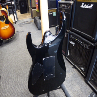 <p>Excellent double cut guitar with great playability, gloss black finish, 2 Powersound humbuckers with high output and great for rock/metal.</p><p>Good condition.</p>