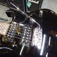 <p>Excellent double cut guitar with great playability, gloss black finish, 2 Powersound humbuckers with high output and great for rock/metal.</p><p>Good condition.</p>